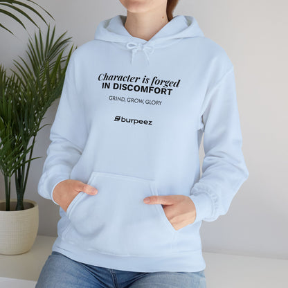Hoodie unisex brodé « Character is forged in discomfort »